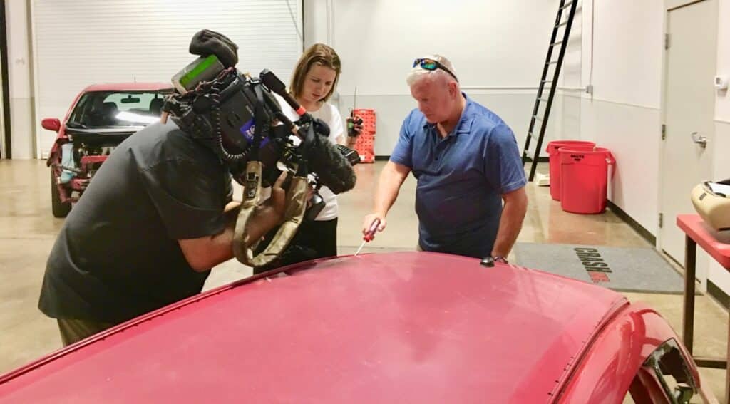 Vehicle Safety Advocate and Personal Injury Attorney Todd Tracy Shows CBS 11 News Crew Where John Eagle Collision Center Should Have Replaced Honda Roof With 104 Spot Welds Instead of Glue
