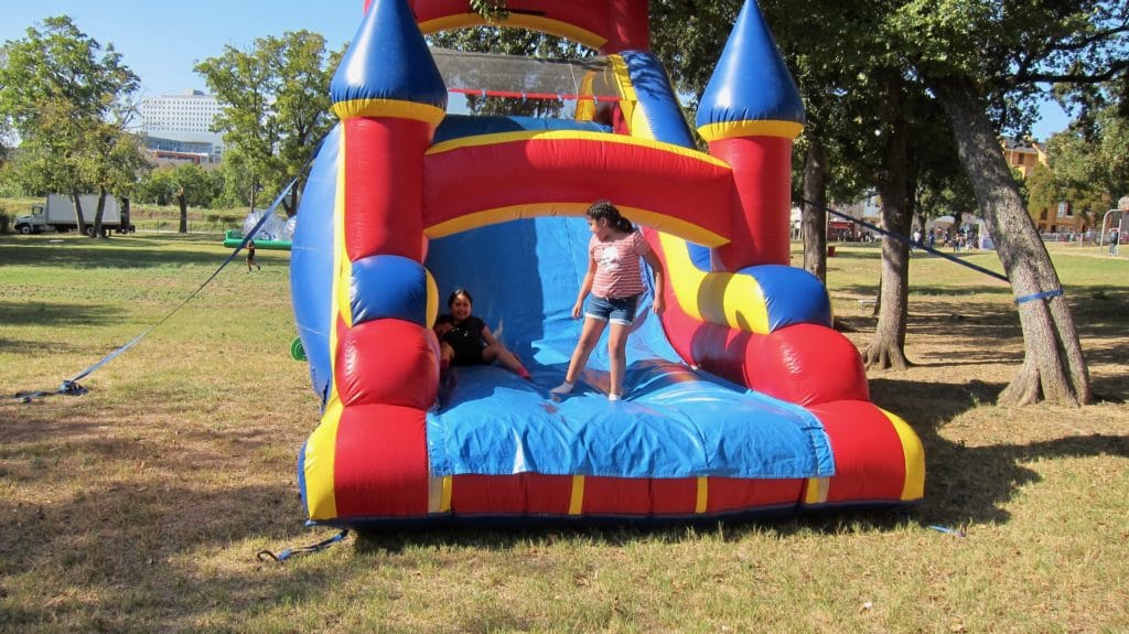 Inflatable Castle Donated by Vehicle Safety Lawyer Todd Tracy for Medano Elementary School Carnival in Dallas
