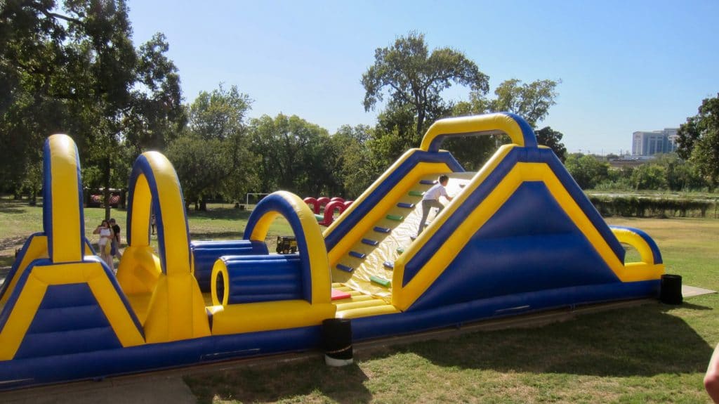 Inflatable Slides and Obstacle Courses Donated by Vehicle Safety Lawyer Todd Tracy for Medano Elementary School Carnival in Dallas